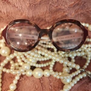 Prada Women's Rose and Cream Sunglasses